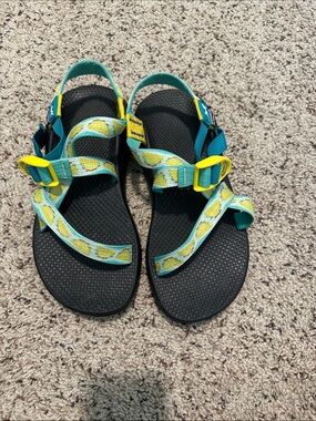 Chaco women’s 7 Black Sandals with Turquoise Lemon-Print Straps & Yellow Buckles